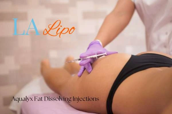 Woman having fat dissolving injections Derby on thighs